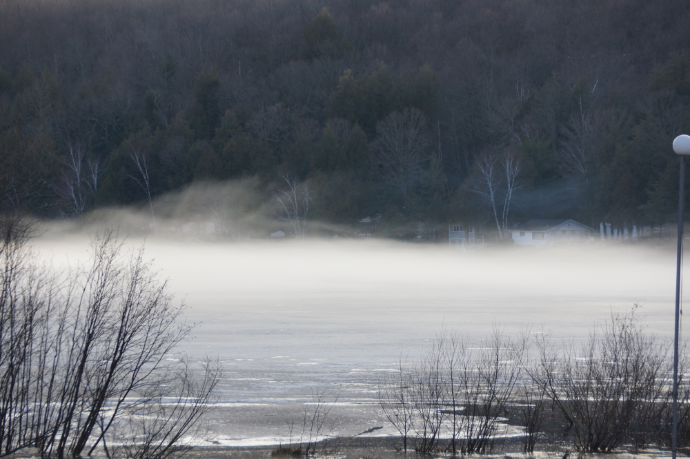 The wet and windless days gave the lake an ethereal beauty beyond its normal magnificence.