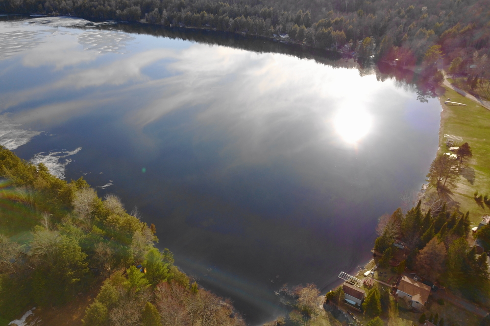 The ice around mid-lake kept us from having a boat in to ski up all the flat.