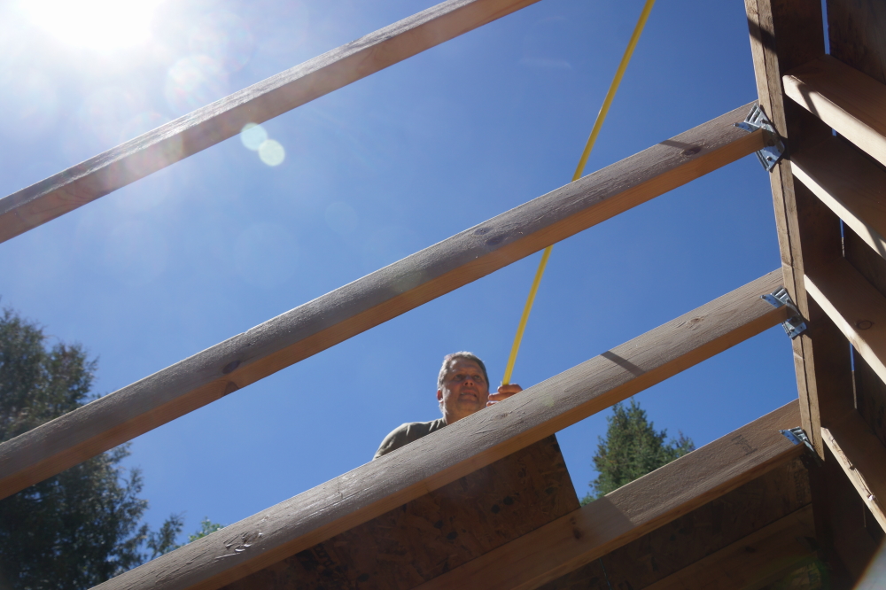 By sunset, the 16 inch holes in the roof were covered up.