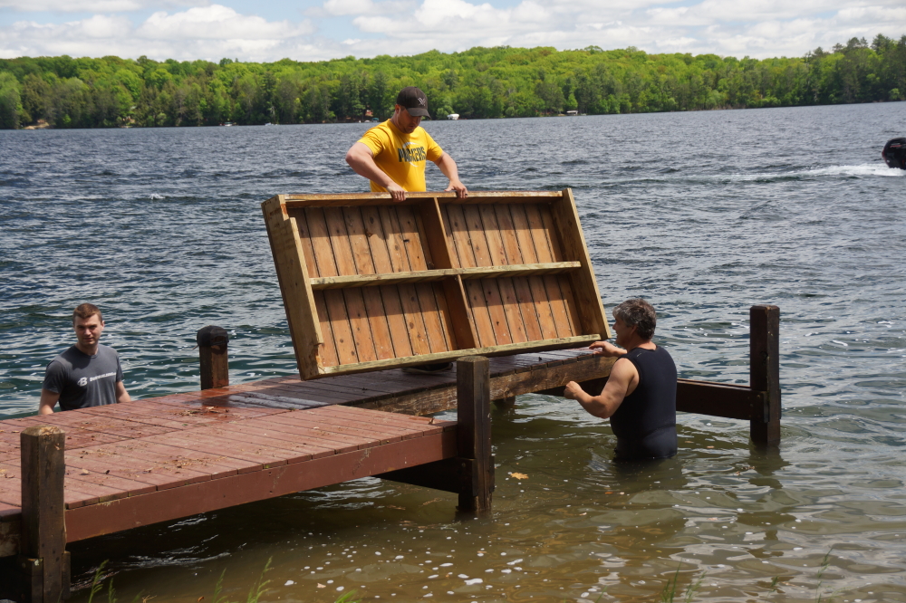 Just when the heat fell from eleven to about four or five, it was time to put in the show dock for the ski club.
