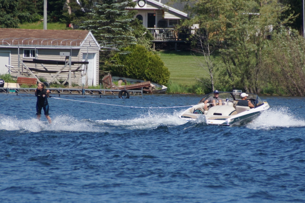 Water sport activity picked up last week.  When it was not raining (more on that later), there seemed to always be a boat or boats on the water pulling a spectrum of water warriors from the amazingly talented to tubers.