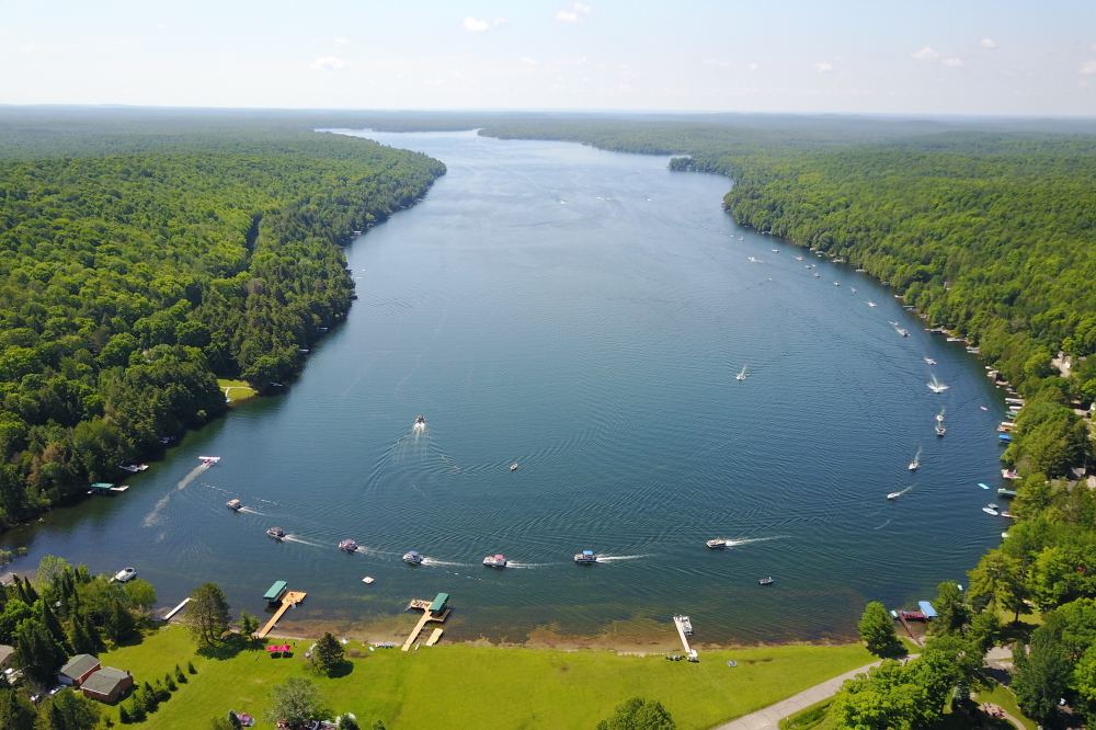 The lake water temperature hit 80°F late last week before pulling back a bit. A few years back, we recorded a temperature of 84°F in late July. If the heat holds, we could beat that this year. If you dive down past 10 feet or so, you hit a layer of lake that's not so warm. Think 70°F. If you go down past 25 or 30 feet, you hit the thermocline. Think 50°F (brr).  The lake level fell a half an inch during June, but is still just 2 inches under the record high recorded on May 1st. Historically, the level should decline around 6 inches until ice-in. If it does, that'll take some of the pressure off the shoreline. If it doesn't, when Lakes Lucerne, Metonga, and Schaefer merge, next year's boat parade will be huge.<br><br><br>-Nemo's not getting out until September.