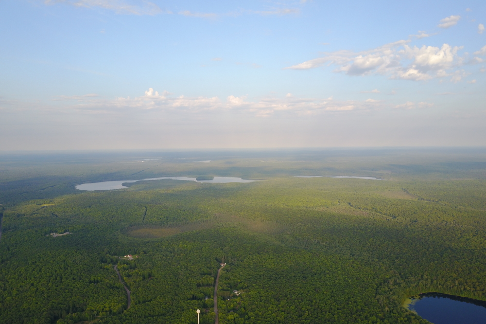 We were assured that the haze we could see on the horizon many nights was just condensing water vapor and not the rising of a new hoard of winged wee beasties from Lakes Wabikon and Riley.