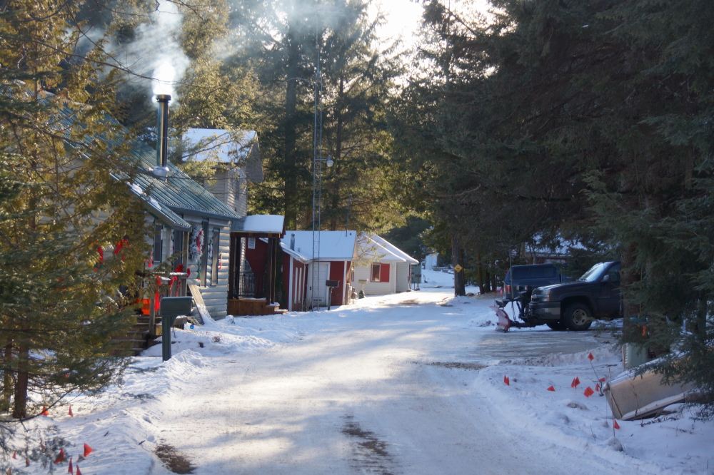 The sun has sublimed most roads free of snow, but not Knott Lane where packed snow-ice continues to cover the gravel.