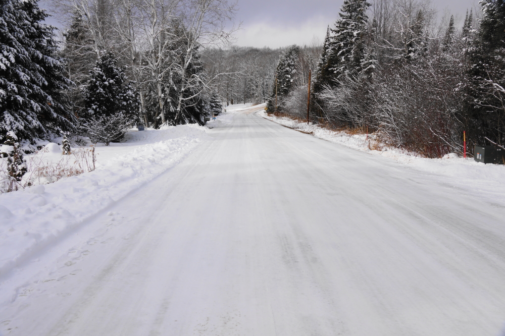 In unrelated to the Bottle Rocket War news, local roads are plowed, but covered in packed snow-ice. Getting up the hill on the North end of the lake can be a close thing. 