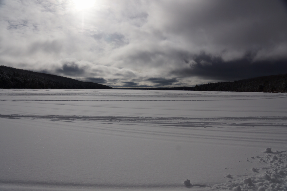 One of the best bottle rocket wars ever. Special thanks to Victoria W. and Mark G. (if you did not get enough bottle rocket war images, <a href='https://photos.google.com/share/AF1QipNwfO35FIBNMAeJEut9rMx9AoxSGtkmmOFg8VrpXuCJTBzVyuYK2tmf_5EWwj20gQ?key=U1k2SWVRX0lUSXFZZGcyV2hTT1pXeExld1I5LUZn' class ='defaultlink2' target='_blank'>Mark has some additional great ones here including a short movie</a>.) for their excellent wartime pictures. With the Annual Lake Lucerne Bottle Rocket War over, all that remains of the season is ice fishing, tapping, and watching the "Orb of Justice" paint the melting wall under it with blue food coloring. And the annual Ice-Out contest. We'll get a link up in a few weeks and an ice thickness check before then.<br><br>-Nemo should have stuck to hot chocolate.