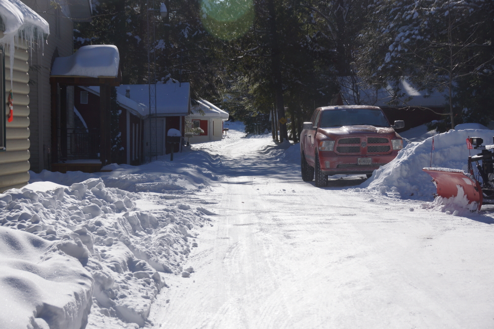 Knott Lane is plowed, narrow, and treacherous.
