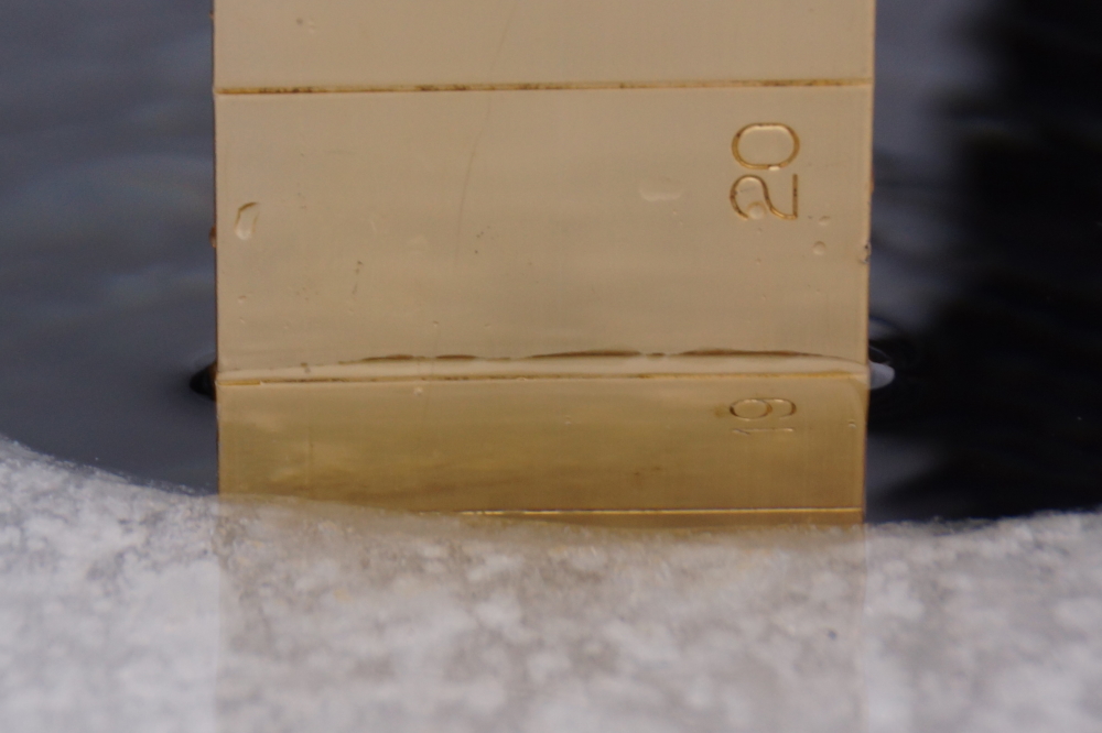 On Sunday, a hole was cut into the lake ice on the North end. There's 19 inches of ice under all that snow and sled.