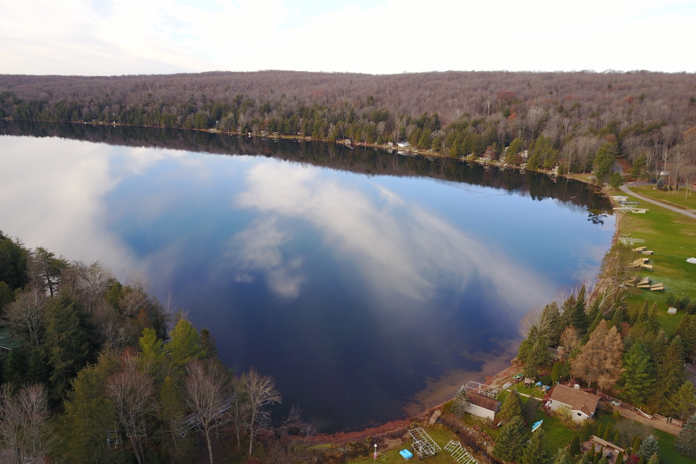 Before the seasonable manifestation began, the lake exhibited some astounding feats of flatness.