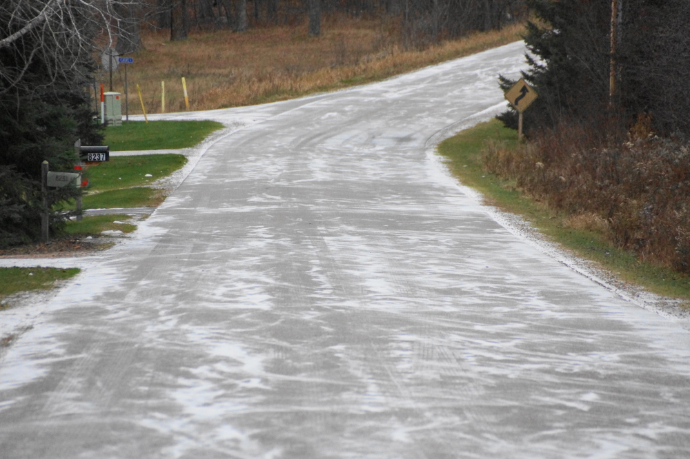 Intermittent flurries have given the roads around the lake a wintery, walk-with-more-caution look.