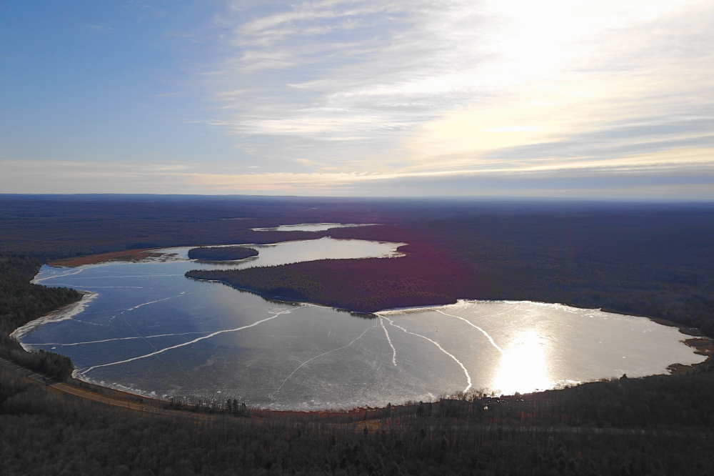Lake Wabikon is completely frozen over. We're not sure when ice-in occurred on Wabikon, but Metonga usually has its ice-in a week or two later and Lucerne a few days after that. 