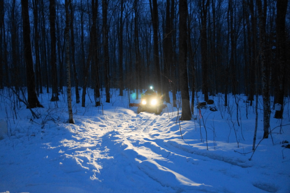 At the end of the storm, the Maples ran hard. The sugarmen collected all the sap until well after sunset to prevent the predicted single digit cold from "pucking" the run.