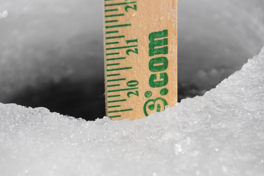 There's 19.5 inches of ice on the North end of Lake Lucerne. The top 6 inches are the airy, frozen snow kind and the rest is the hard, clear as glass type. With all the cold this season, I'd have thought it would have been thicker.