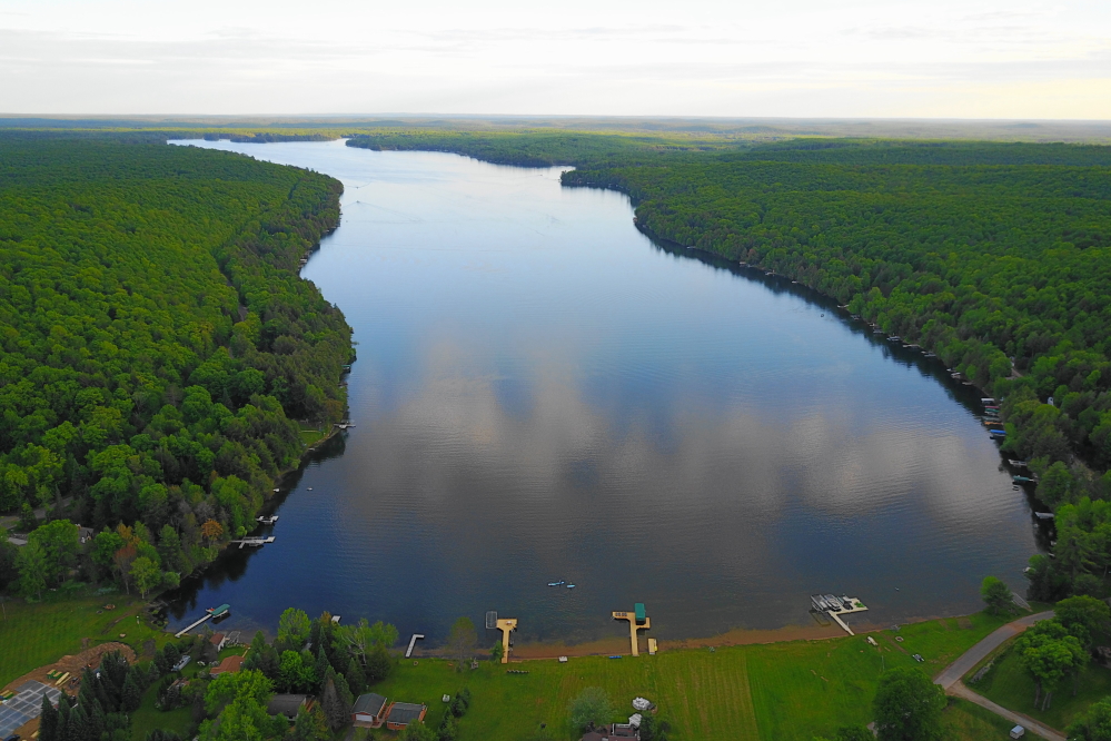 Last week marked another 5 to 10 degrees Fahrenheit below average. These things tend to even themselves out over time, so we're expecting a hot Summer that should extend well into Fall. Huzzah! While there was some rain last week, there was not enough to hold the lake level. It looks to be down an inch or two from the first of the month. With the coming extended Summer (fingers crossed) and the falling lake level, be sure to get those lifts in deep enough to prevent a shallow lift boat trapping. It would be a pain to have to call the pontoon crane guy every time you want to go skiing.<br><br><br>-Nemo's on the dock with a tow handle in one hand and a tissue in the other.