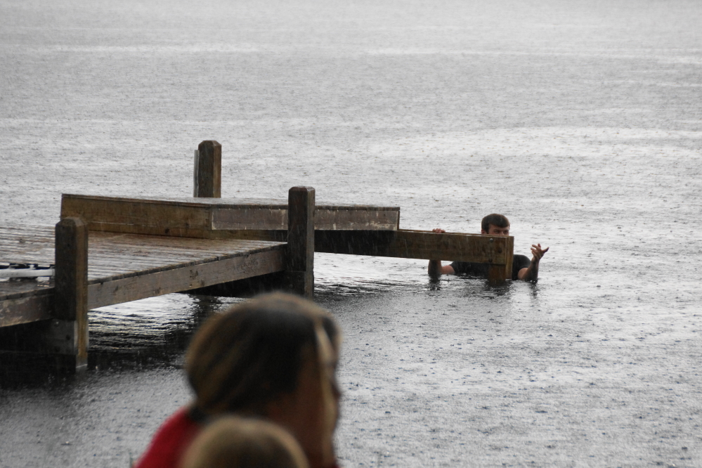 The ski show wash out was not without a hunk of productivity and showmanship. Pyramid building and footing in the rain was ruled out, but a little rain would not stop the men from completing the show dock.