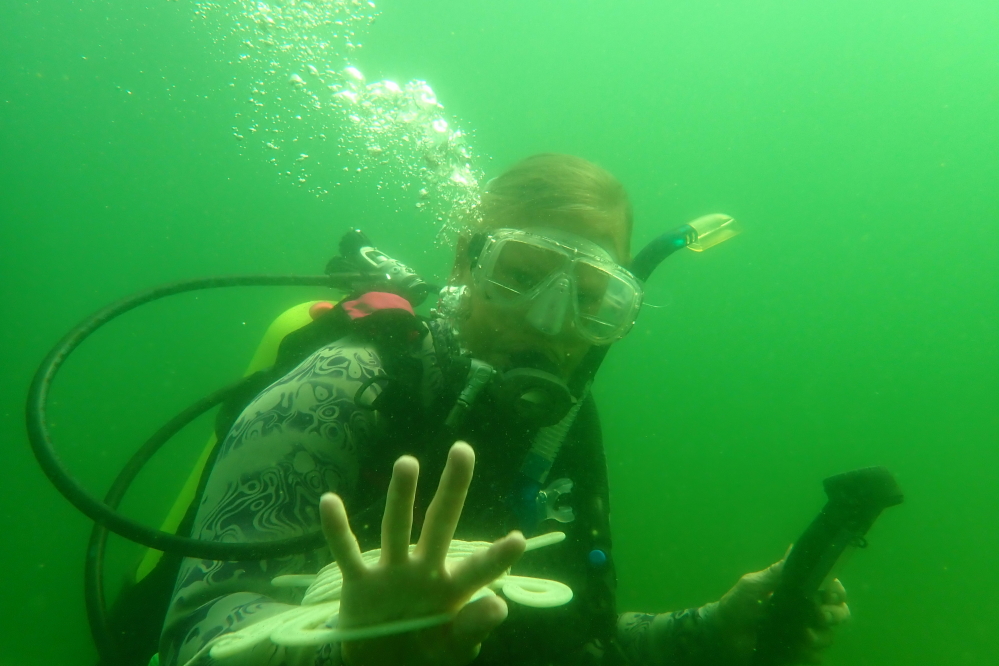 In a first adventure, a lone diver intended to find a deeper crib that is 120° from our pier and out about 200 or 300 yards. The diver ended up getting distracted by a fish or something and got all lost. While the diver did not know where he was exactly, he did know the shore was to the west so getting back wasn't hard. The second dive would have another diver added for both safety and superior navigation.