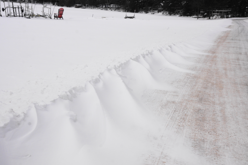 There was not much new snow last week, but some wind before the warm grew some drifts into roads.