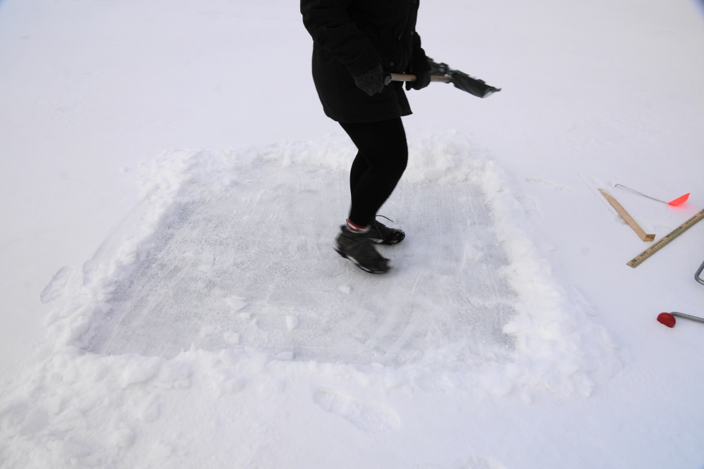 There's currently less than an inch of snow covering the lake ice.