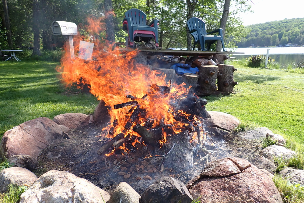 By the weekend, the wind shifted from the North and the lake temperature shifted to September. During the celebrated warm period at the start of the week, divers knew that the 74°F water temperature was brittle. If a dive took you below 8 feet or so, the water got colder. The wind from the north took all that warmer surface water to the south and the colder water started to well up on the north end. By Sunday the lake temperature fell to 61°F. Friday's 37°F morning low did not help. Campfire size directly reflected the loss of lake heat.