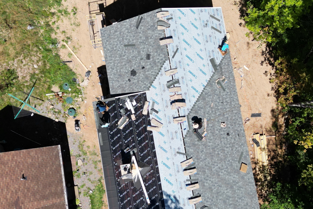 As the week went on and the temperatures went up, some houses got more shingley.