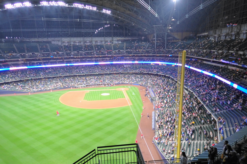 After they lost, the assembled stayed, red uniformed security men took the field, and another game was broadcast live on the ginormatron. The cheer from the crowd was louder than at any time during the game as the fans watched their rival for the Central Division title also lose, backing the local team into the post season as divisional champs.