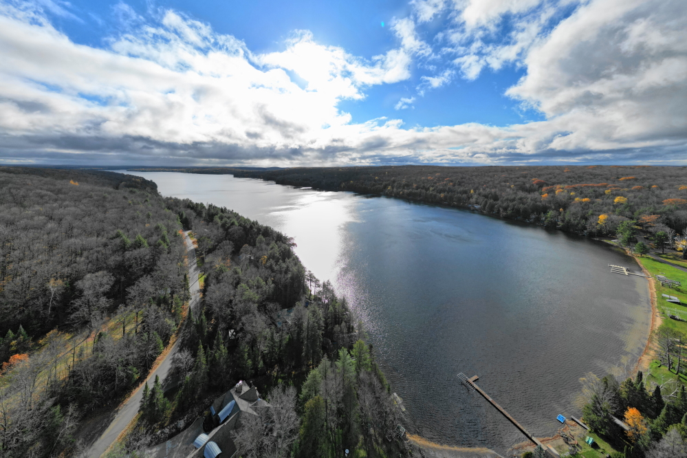 By late Friday afternoon, the clouds started to break up and the sun came out. A short while later, the clouds regrouped and a few light showers hit the lake area again. 