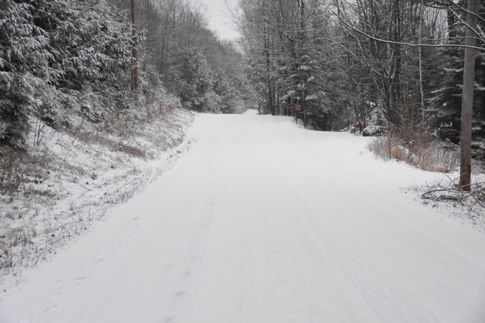 All the little snow events have left Lake Lucerne Drive covered with an inch or two. In some spots, there is some very smooth ice under that white. Walking without metal spikes attached to boots can lead to unexpected contusions.