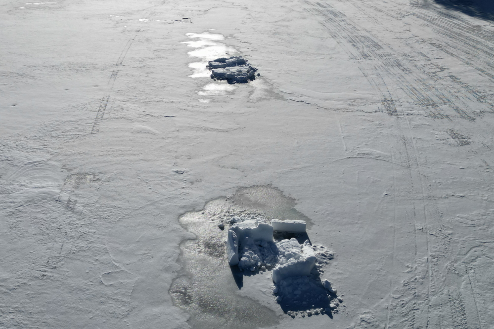 Sunday morning was greeted by a dusting of snow on the lake ice.