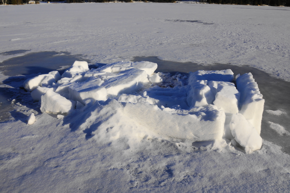 The northern fort was transformed into a strangely uniform lump of snow.