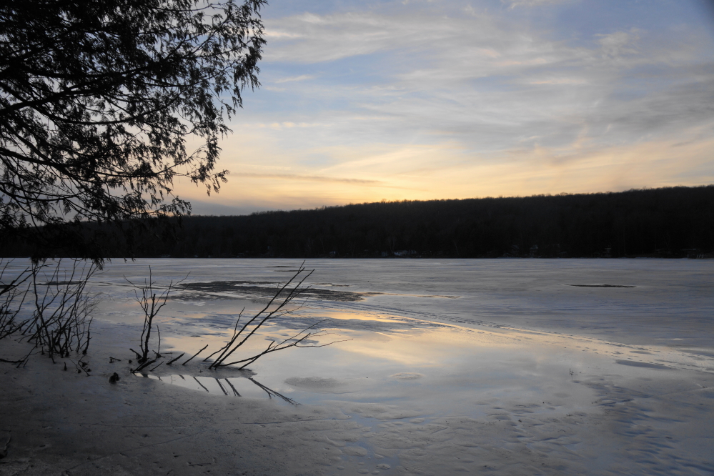 The warm came back for the weekend. By Saturday, puddles were back on the lake.