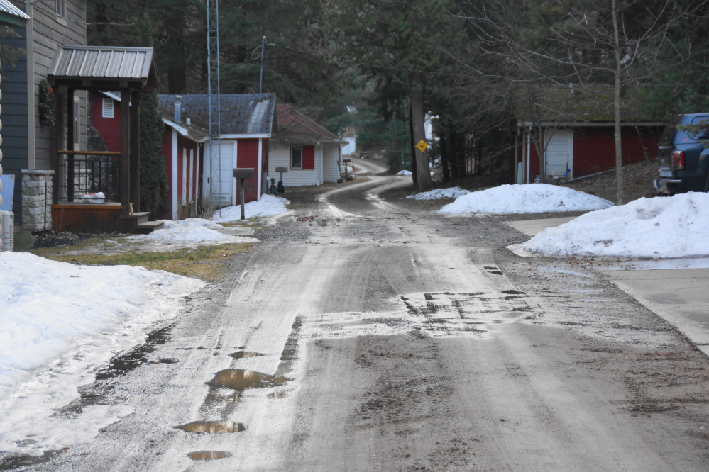 Knott Lane is mostly snow free, but really squishy. Walking the lane is fraught with micro-soakers and mudded up shoes.