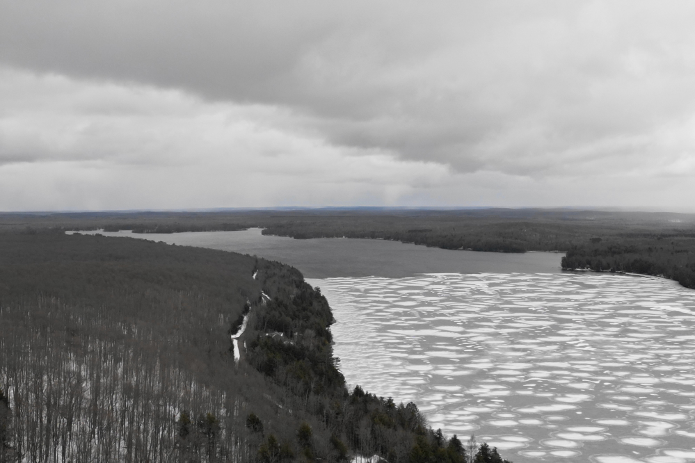 The strong wind that came with the snow swept the south end of the lake clear of ice.