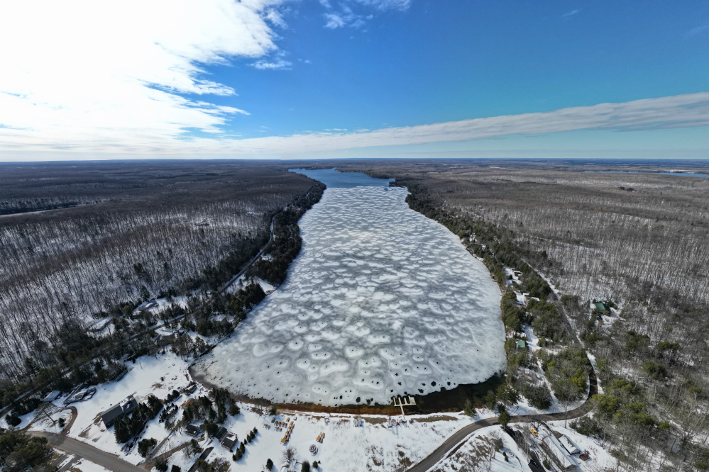 After the storm moved on and a blue sky rolled in, the south was open and the north end was getting there, but the north eastern and western shores were iced tight.