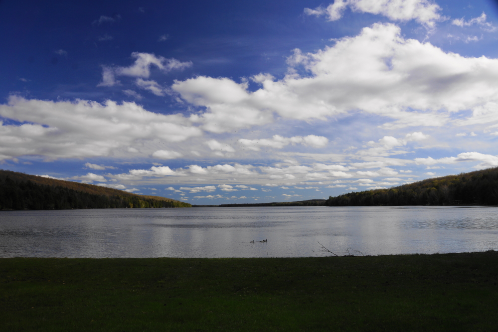 It left behind a few clouds and a deeper lake.