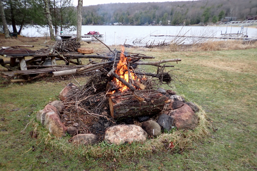There were not many campfires around the lake last week. The few spotted were of unusual size due to spring clean up activity.