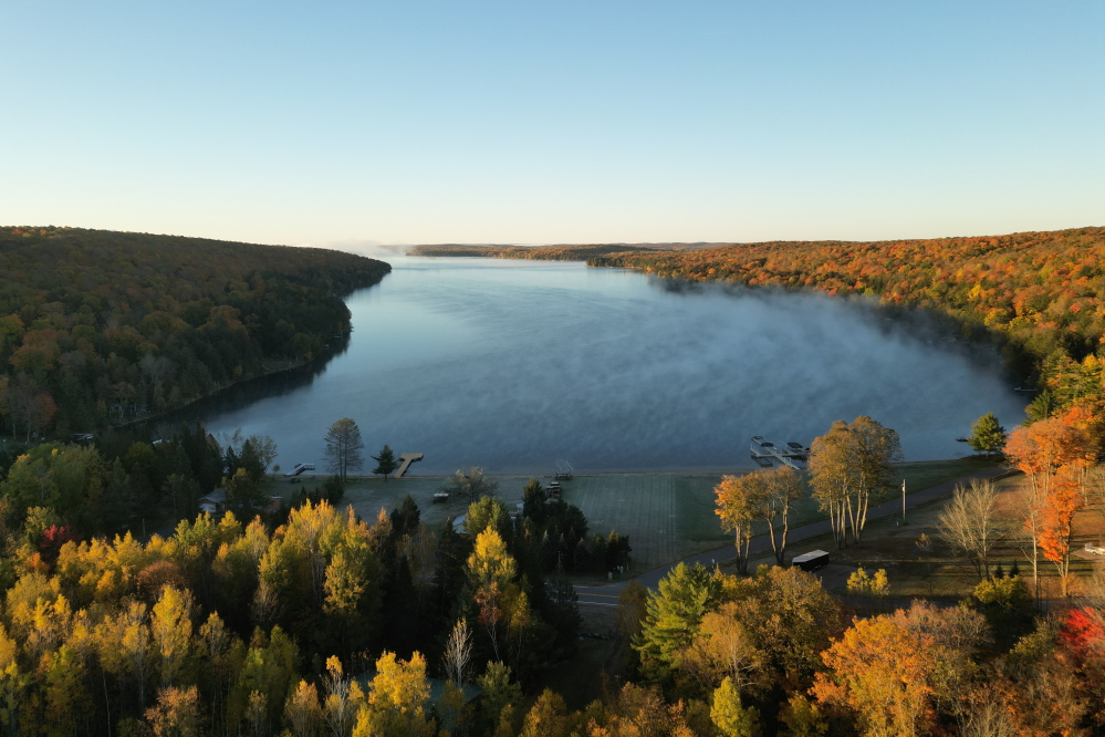 The northwoods became more autumnal  last week. In addition to the shortening daylight and tumbling leaves, the temperatures fell. By the weekend, highs and lows were below normal. We were not so sad over the lack of diving, swimming or skiing.