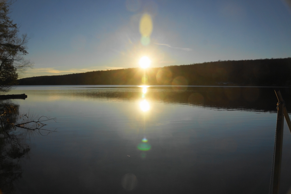 It was not all clouds and rain. There were a few evenings that included sun and flat water. Nobody skied, especially me.