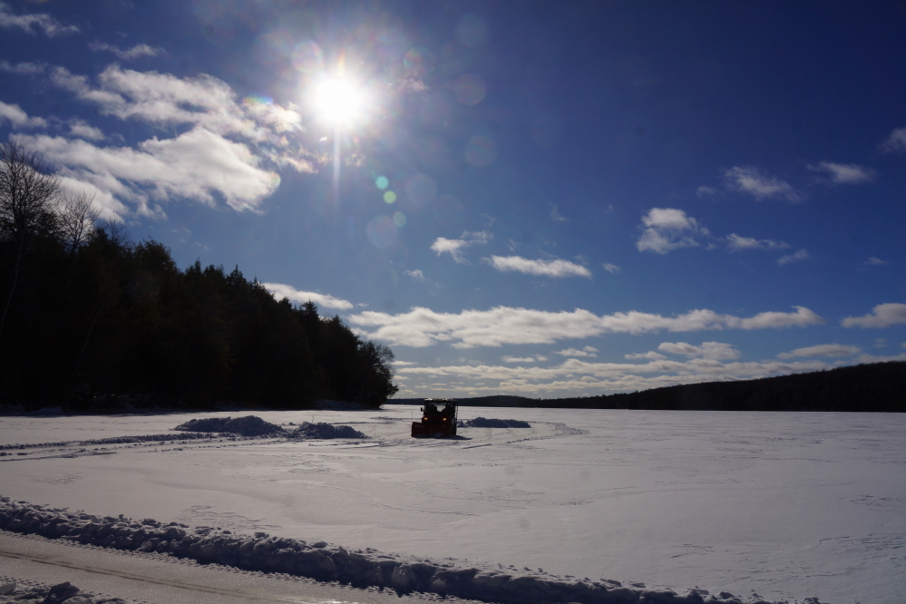 After the snow and before the bone chilling cold, the site of the 34th Annual Lake Lucerne Bottle Rocket War was surveyed and graded. 
