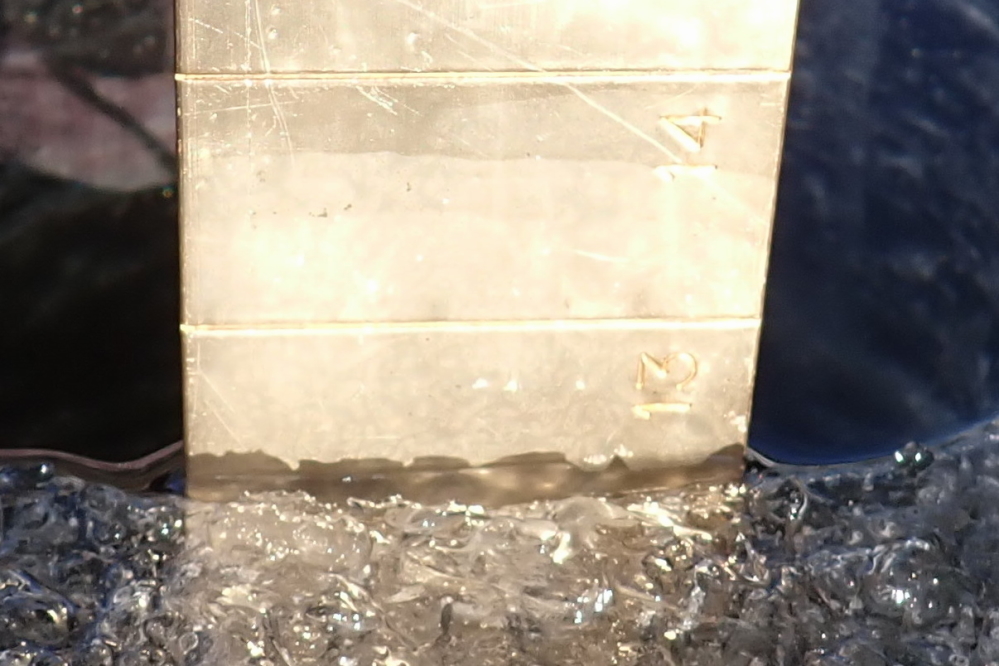 There was a gain of about an inch of the hard stuff in the 5 days between measurements.