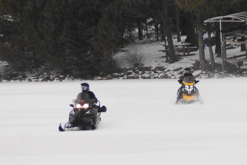 The word went out. Soon afterward a small pack of snow machines were cruising around Lucerne.