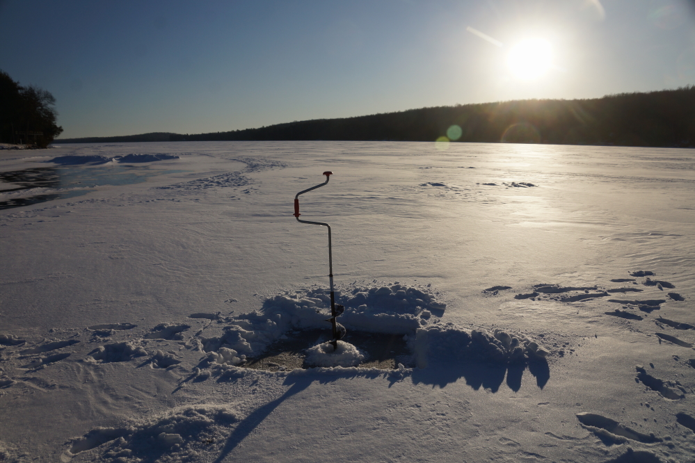One of the first tasks of the week was to check the lake ice thickness. It took a while to drill the hole.