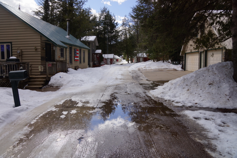 Knott Lane has its issues. It would sort of thaw during the day and refreeze at night. By the end of the week, about a third of the lane was clear. The remainder is covered with a hard, treacherous, and surprisingly thick coating of ice.