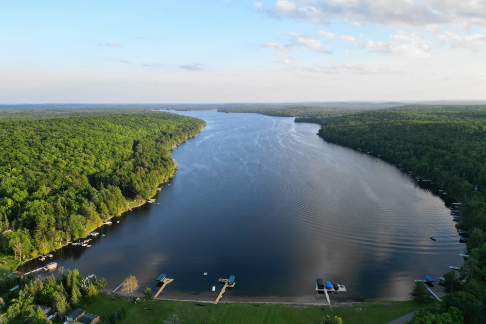 The lake level is 26 inches above the nail. That's 11 inches short of the record of 36 inches set back on August 1st 2020. It'd take 2 or three big storms hitting in close succession to get to a new high water mark.  It's unlikely that we'll see a new record this year, but you never know. If we don't get a parade of rain, that's fine. In addition to the 4th of July parades last week, we have a parade of ski shows through the end of the month. We'll be there every Monday and Wednesday to take pictures and, when the weather permits, to drone tiny holes in the sky above the shows.<br><br><br>-Nemo likes his lake swimmable and local road construction finished.