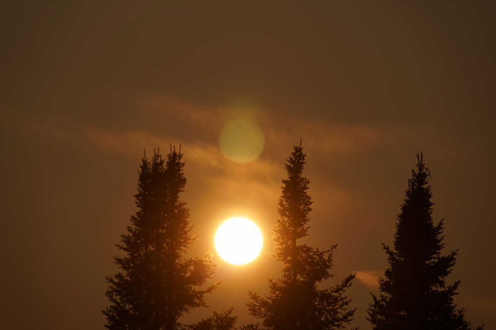 The smoke can take visibility down and make breathing worrisome, but it makes for some cool sunsets.