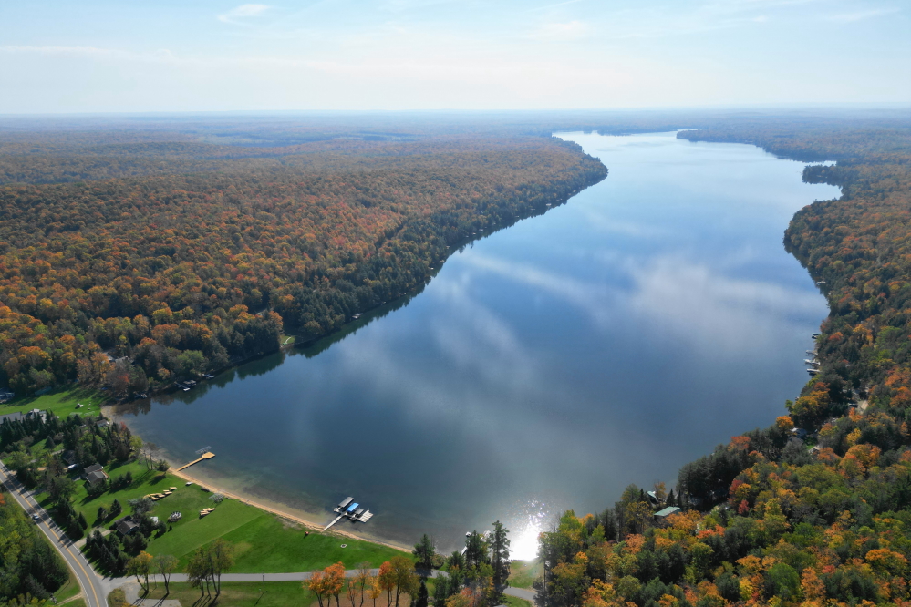 On Friday, October 3rd the sun was out, lake was glass, and, if you throw out the pines and a few stubborn basswood, the trees peaked.