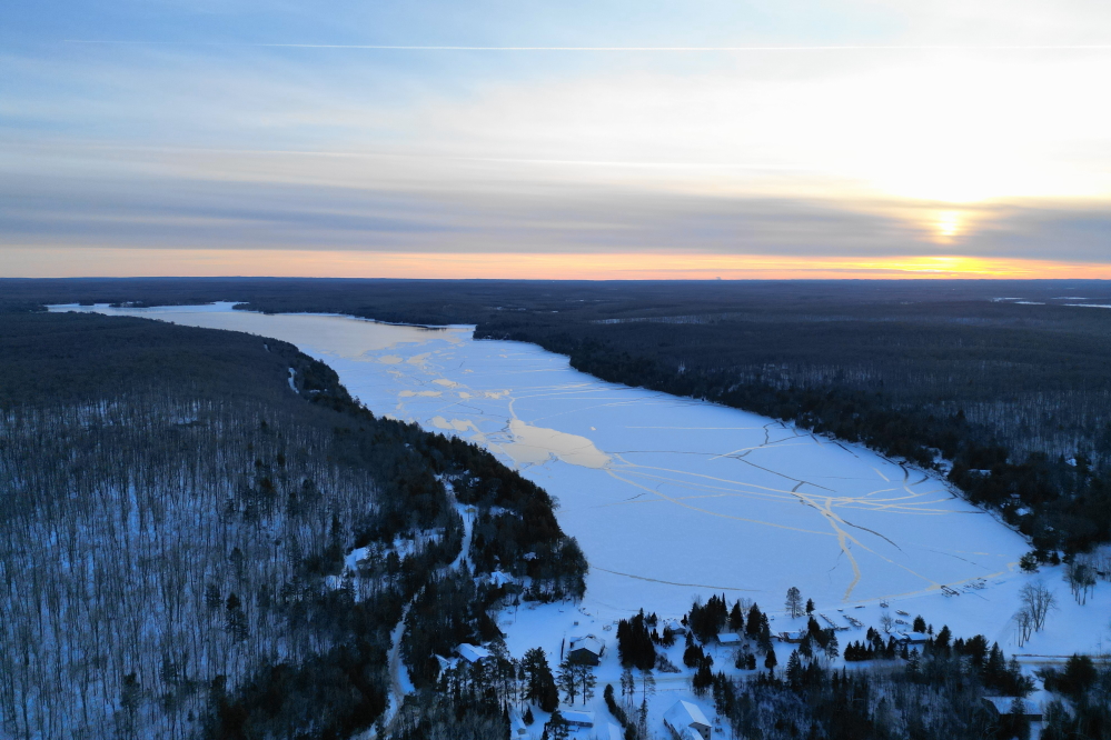 Ice-In? No, not yet. There's still open water in the south-ish on Sunday just before sunset. It's gonna get ugly cold and footingly calm in the wee hours of Monday. I'd be surprised if any of the lake remains open after the 10th. In addition to the impending ice-in, there's growing frost in the ground, annoying ice on Hwy W, and a goodly amount of snow everywhere. Building forts for the coming Annual Lake Lucerne Bottle Rocket War (January 17th, 2026) will not be bedevilled by a lack of building material. Looks to be a good snowmobile season, too.<br><br><br>-Nemo got a warmer jacket just in time.