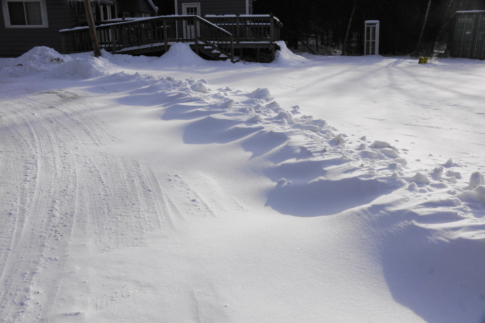 There was wind, too. There has not been much snow lately, but the wind picked up what there was and began to sculpt drifts across roads and driveways. Each work of winter was smooth, tapered, and (when deep and long enough) an annoying impediment to local travel.