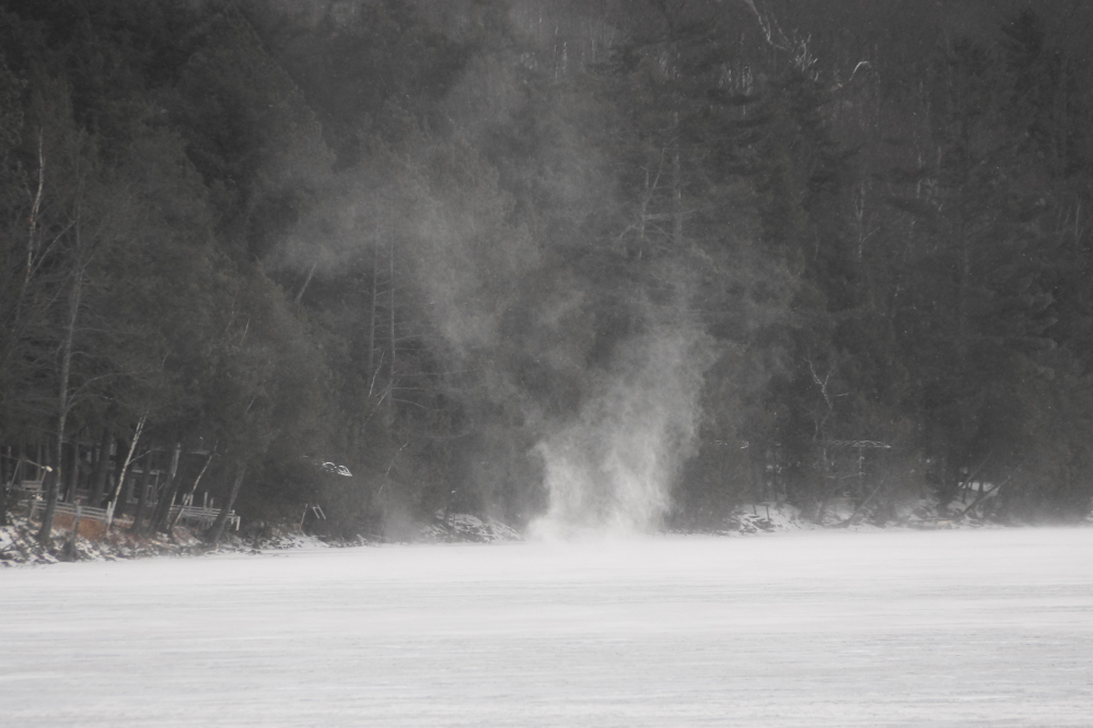 As the temperature plummeted, the last of the rain fell as snow. Then came the strongest wind of the week. On Lucerne, snow devils twirled  from west to east all day Saturday.