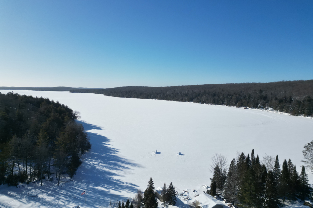 The weekend cold that smothered the area kept most, but not all, snowmobiles off the lake.