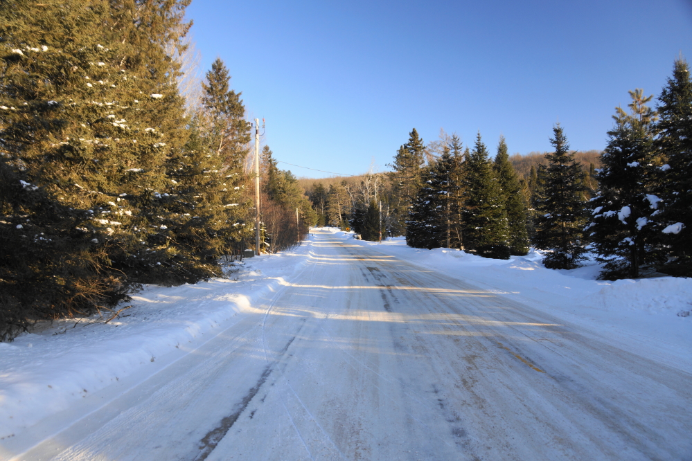 A little bit of county sand has made Potawatomi Trail a little better. The snow on Knott Lane didn't get packed into ice. Strangely, its condition was the best of all.